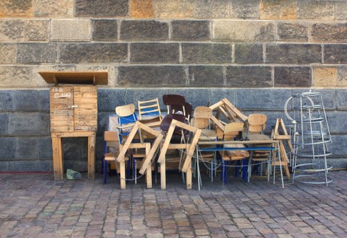 Professional office clearance team removing furniture in Camden Town