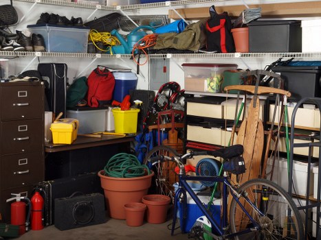 Homeowner reviewing cleared garage space